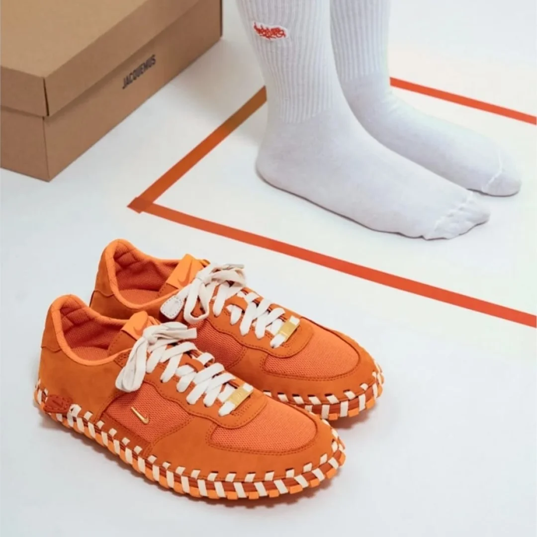 Nike x Jacquemus J Force 1 Low LX SP sneaker in the "Bright Mandarin"
